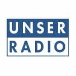 Logo da emissora Radio Unser 98.7 FM