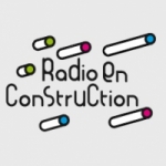 Logo da emissora En Construction 90.7 FM