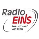 Logo da emissora Eins 100.6 FM