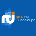 Logo da emissora Radio Caraibes International 98.6 FM
