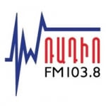 Logo da emissora Im Radio 103.8 FM